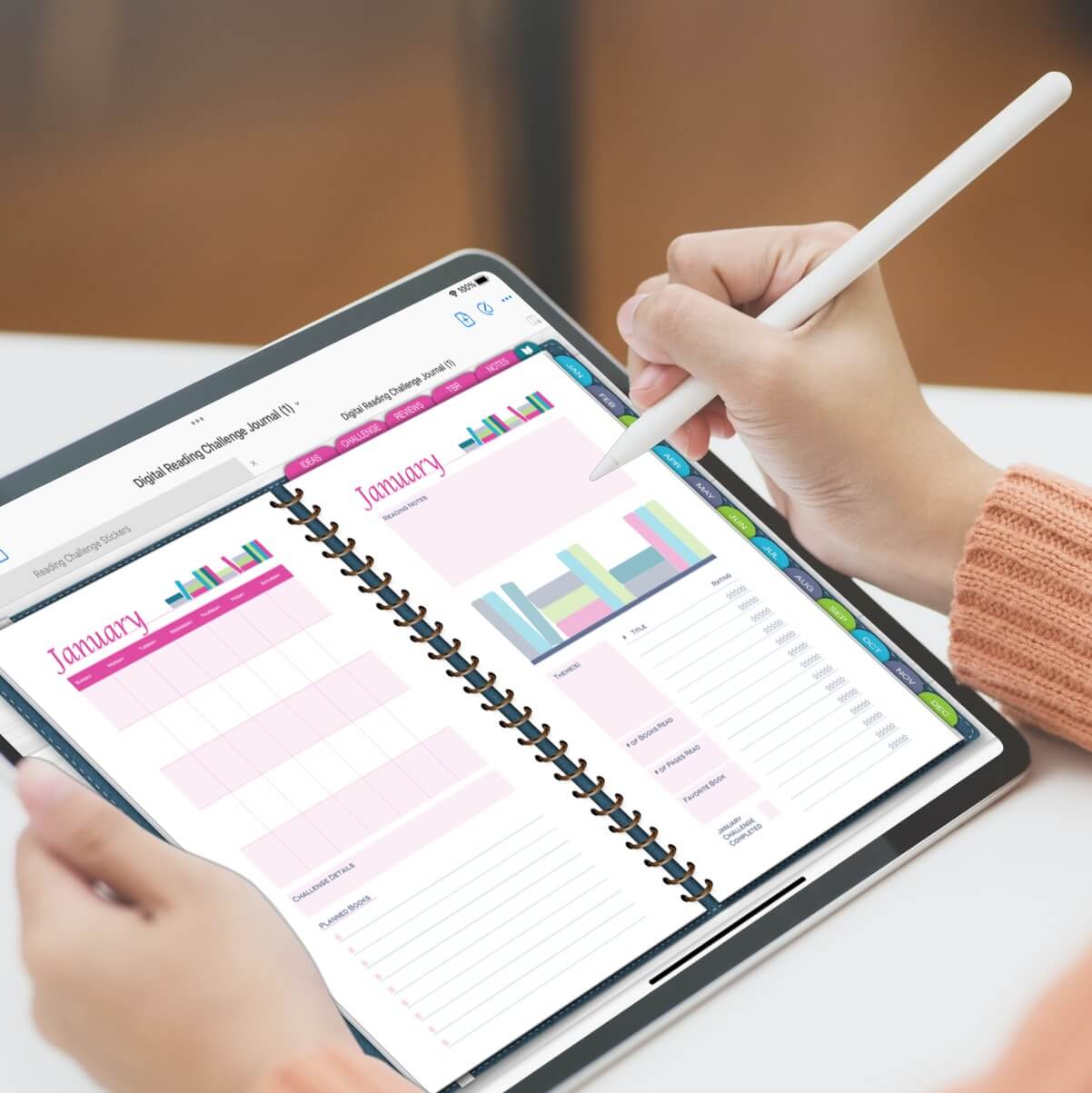A person using the digital reading challenge journal shown on an iPad in the GoodNotes app.