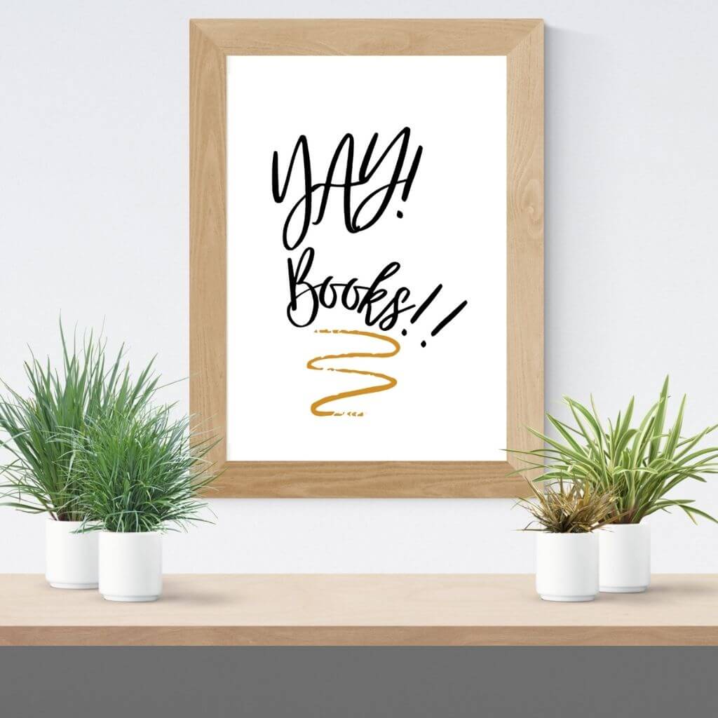 Printable reading poster in a wood frame that reads YAY! Books!! with a gold underline